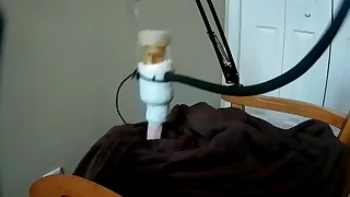 Poyostick Deskmount adjacent to an increment of a Venus 2000 Masturbation Machine